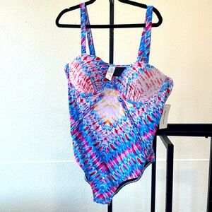 This easy fitting 1 pc. It has a Fun sweetheart neckline, and tummy smoothing.